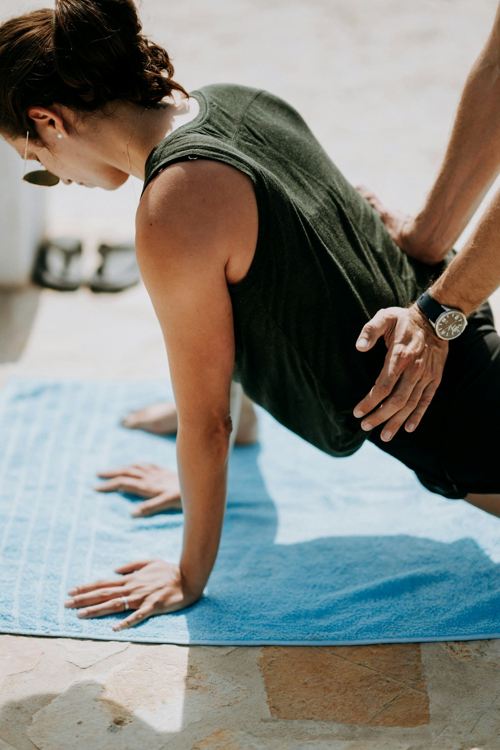 Practitioner guiding a client through assisted movement and Structural Integration